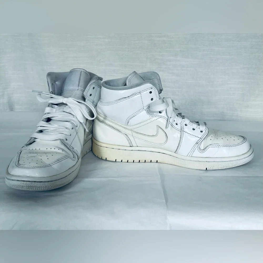 Nike Air Jordan Retro 1 Triple White Patent Leather High-Top Sneakers